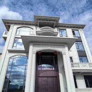 拉萨白麻别墅外墙干挂石材效果示例