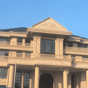 拉萨黄金麻别墅外墙干挂石材效果示例