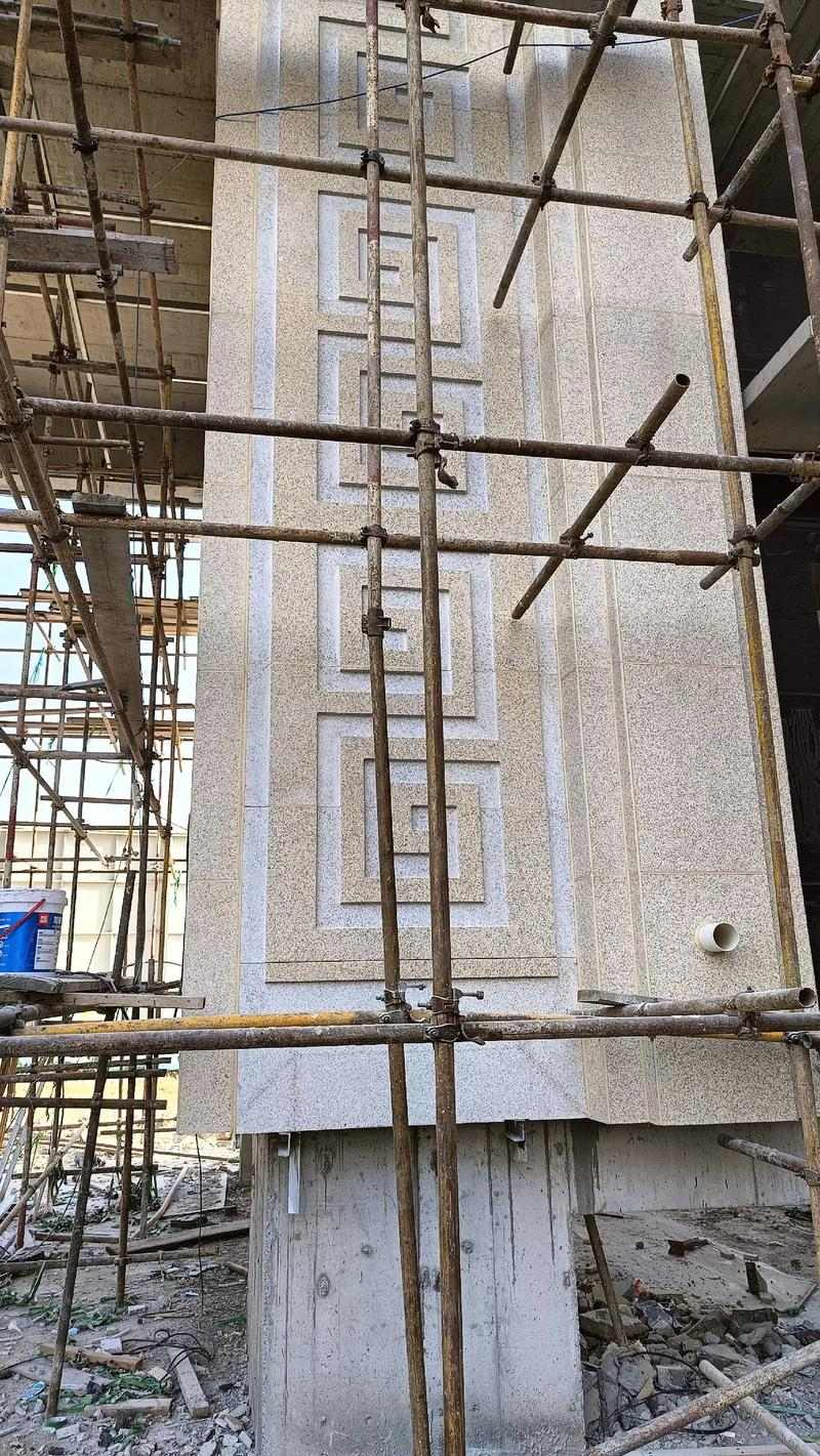 拉萨 黄金麻花岗岩别墅外墙干挂回纹造型效果